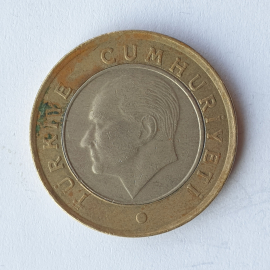 Монета одна лира, Турция, 2009г.. Картинка 2